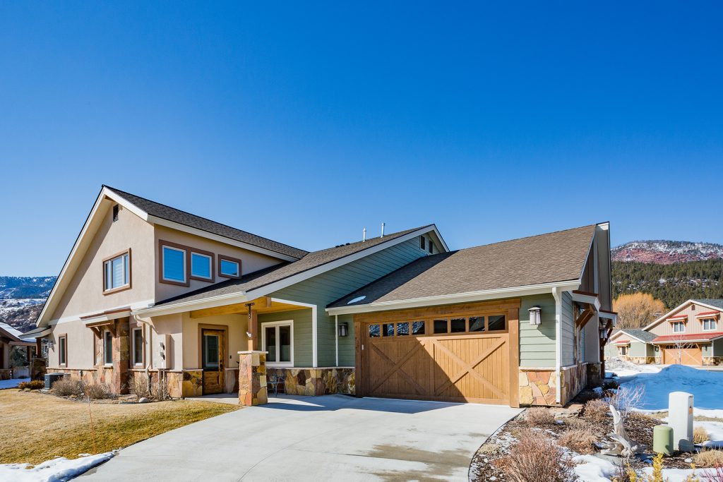 Incredible location in Trimble Crossing facing red rock cliffs, pond and waterfalls. This like brand new (seasonal home) Hermosa Plus model has 2 levels featuring the Master Bedroom Suite.